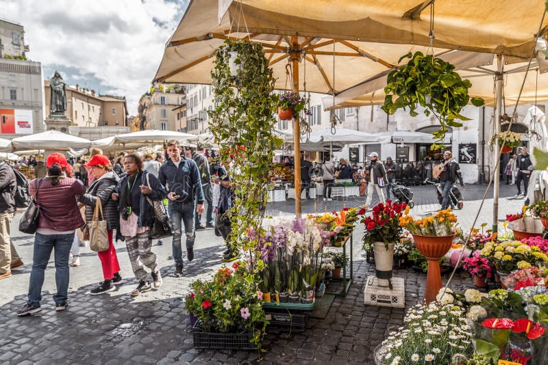 Campo dei Fiori, Rome. Rome, Italy - April 7, 2019: Campo dei Fiori and the Statue of Giordano Bruno in Rome, the Italian Capital. The square is a famous flower stock images Campo dei Fiori, Rome. Rome, Italy - April 7, 2019: Campo dei Fiori and the Statue of Giordano Bruno in Rome, the Italian Capital. The square is a famous flower stock images