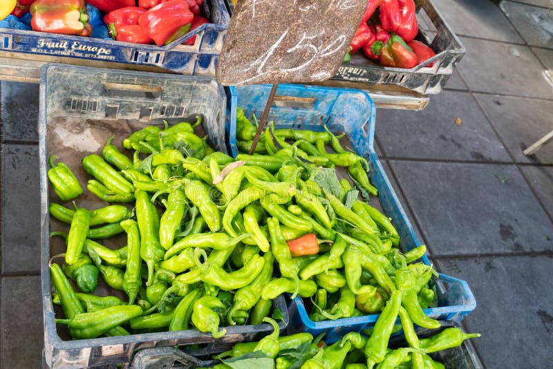 Rome, Italy - August 4, 2018: Farmers` market, green chili peppers