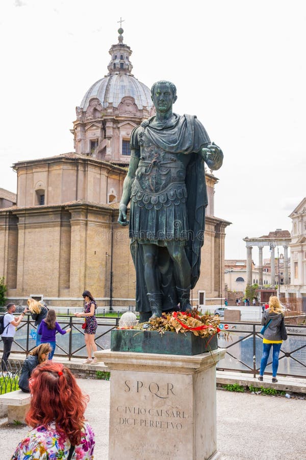 ROME, ITALY - MAY 3, 2019:  Bronze monumental statue of Caesar in Rome, Italy in spring