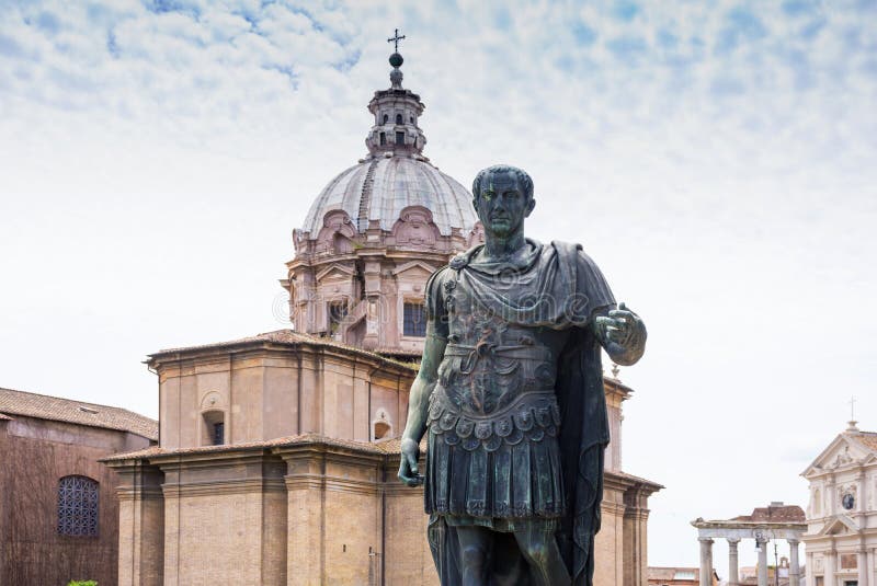 ROME, ITALY - MAY 3, 2019:  Bronze monumental statue of Caesar in Rome, Italy in spring