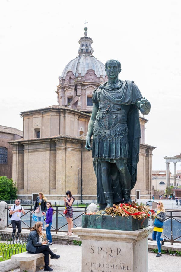 ROME, ITALY - MAY 3, 2019:  Bronze monumental statue of Caesar in Rome, Italy in spring