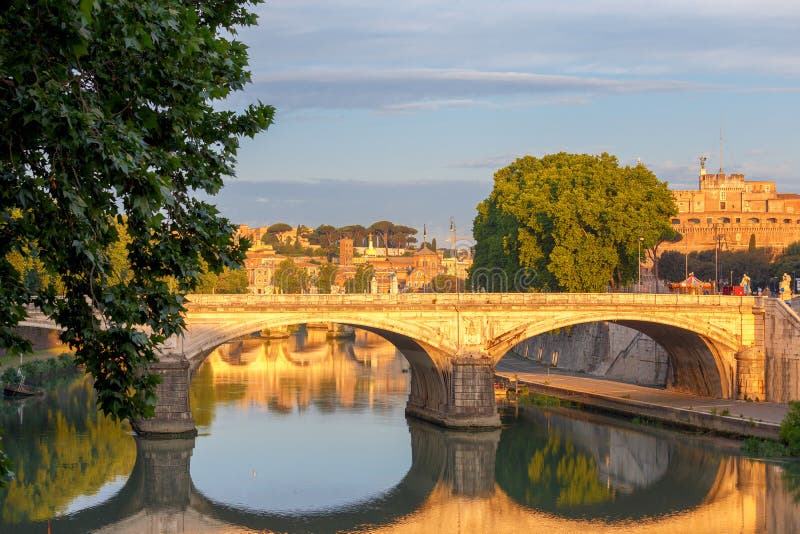 Umberto I Bridge across the Tiber River at dawn. Italy. Umberto I Bridge across the Tiber River at dawn. Italy.