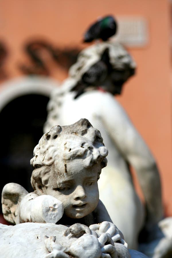RomeStatue in Piazza Navona. Stock Image Image of close, flowers