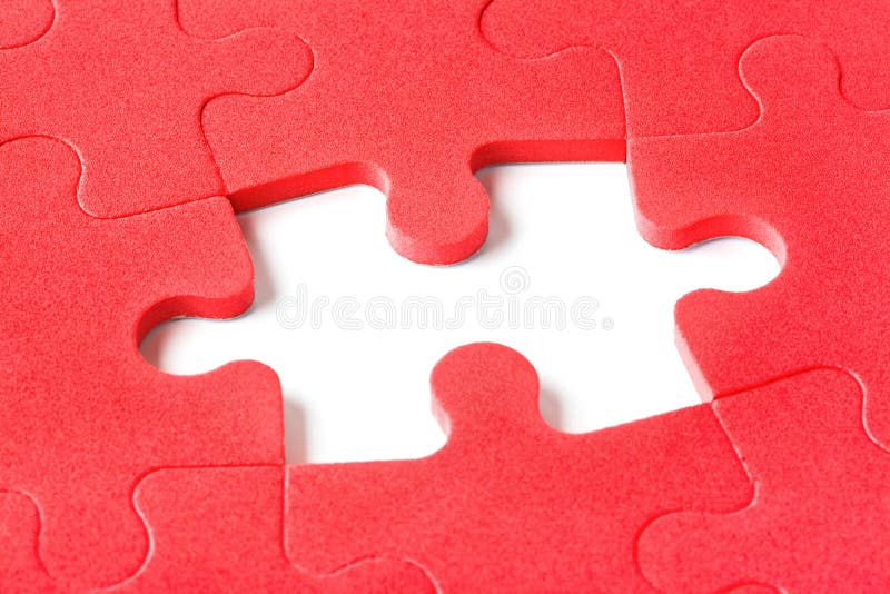 Rompecabezas Blanco Con Una Pieza Que No Encaja Foto de archivo
