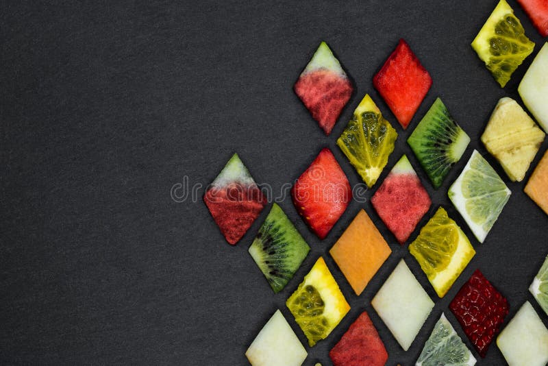 Rompecabezas de la fruta de la forma del diamante foto de archivo libre de regalías Rompecabezas de la fruta de la forma del diamante foto de archivo libre de regalías