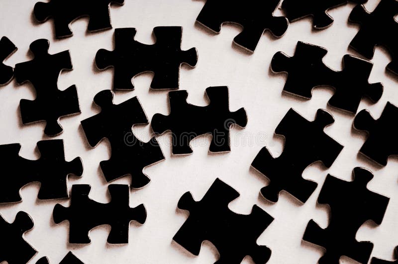 Rompecabezas Negro En Un Fondo Blanco Fotos De Stock Download 870