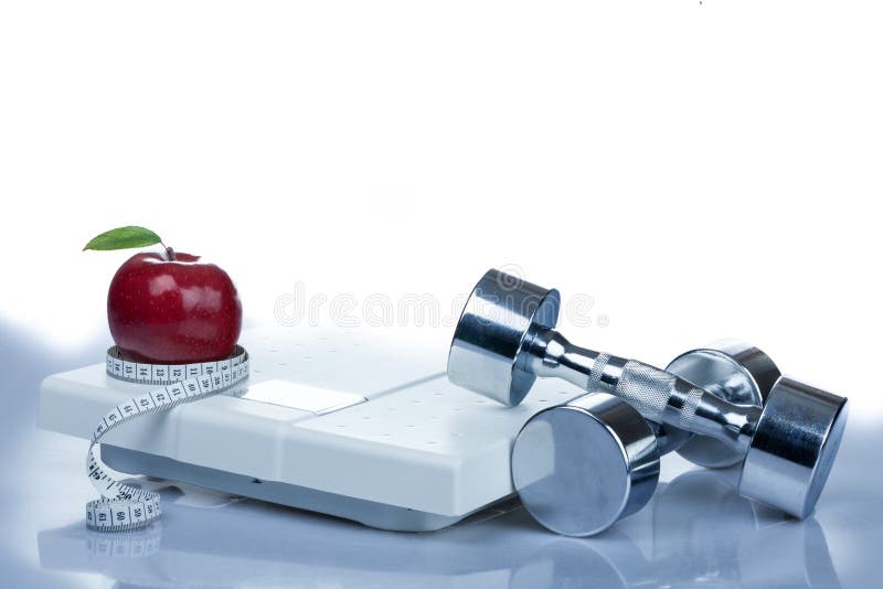 Rood Apple, die Band, Domoren en Gewicht meten royalty-vrije stock afbeelding Rood Apple, die Band, Domoren en Gewicht meten royalty-vrije stock afbeelding