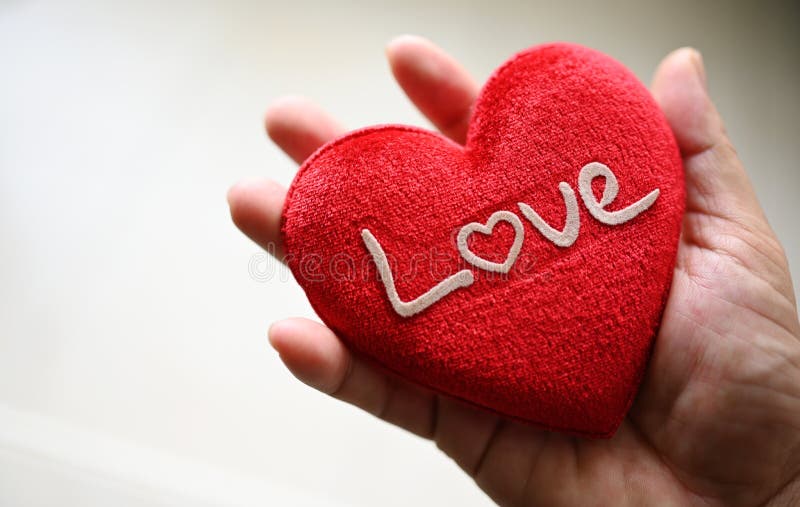 Red heart In hand February 14 Valentine`s Day. Red heart In hand February 14 Valentine`s Day