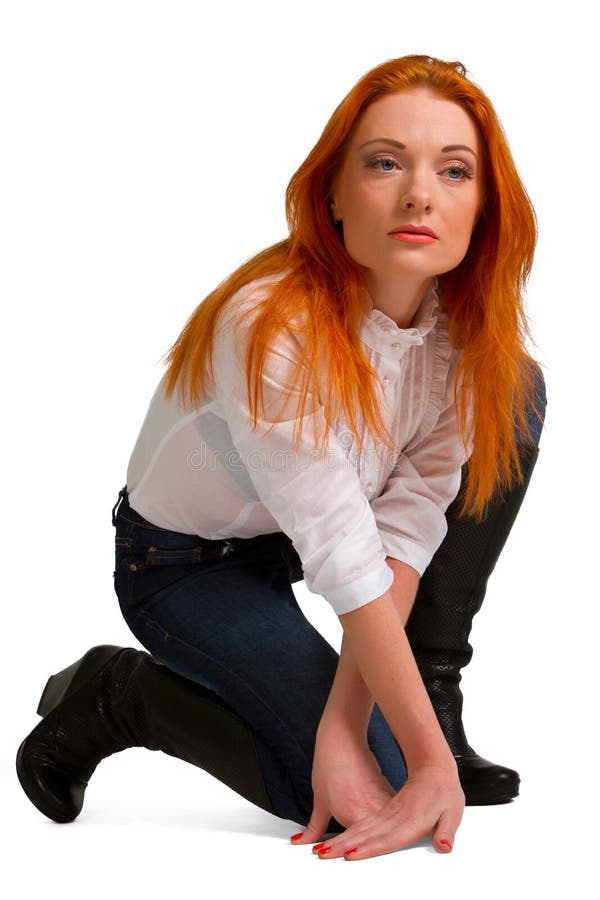 Roodharig meisje in een witte blouse stock afbeeldingen Roodharig meisje in een witte blouse stock afbeeldingen