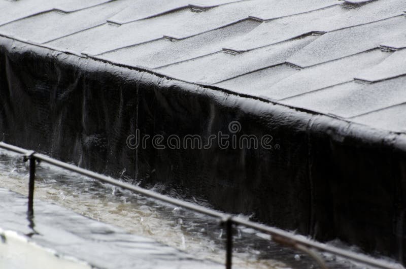 The roof in the rain stock image. Image of real, rain 194148543