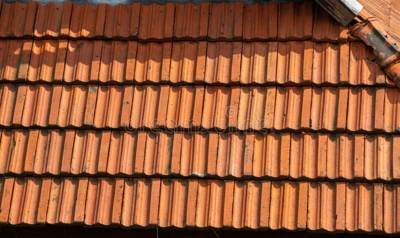 roof tile. tile roof of a old house. tile roofs used in old and modern style construction for safety and also it keeps