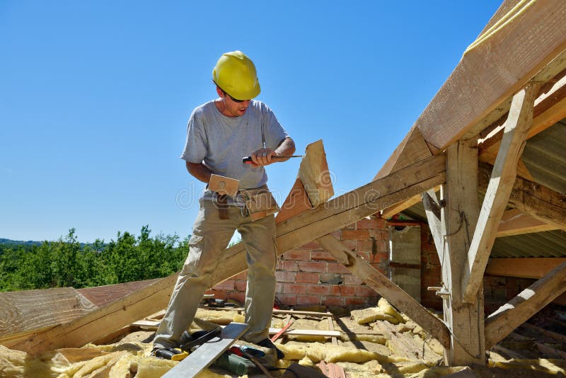 Carpenter Works with Hand Saw Stock Image Image of plywood, roofing