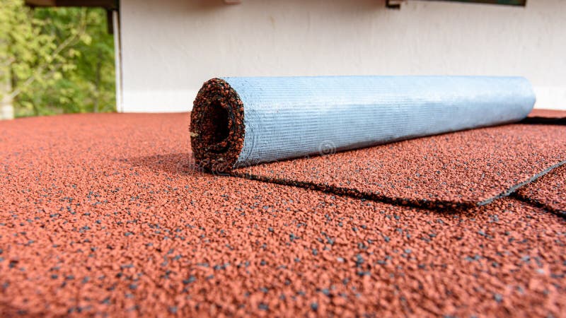 Roofing material - flexible roll bitumen shingles royalty free stock images