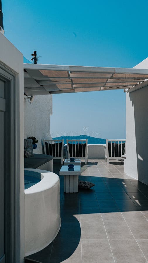 Rooftop Terrace with Sea View and Jacuzzi in Santorini stock photo