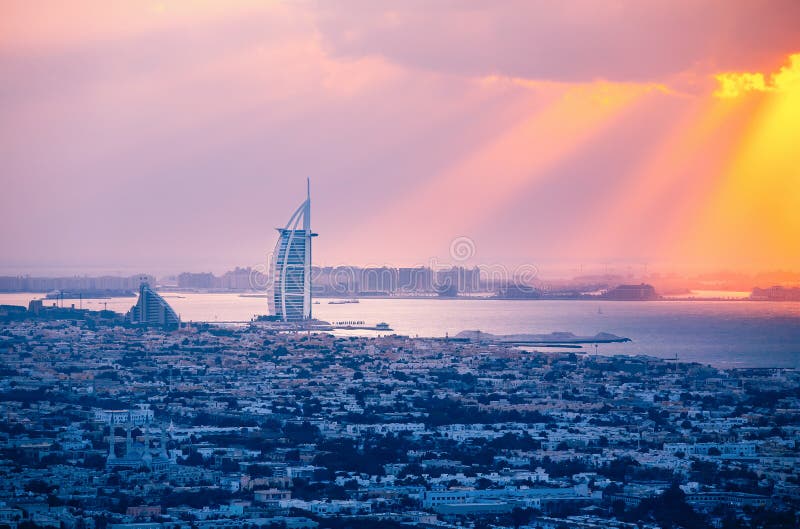 Rooftop View of Dubai Architecture at Sunset with the Sea Side. Stock
