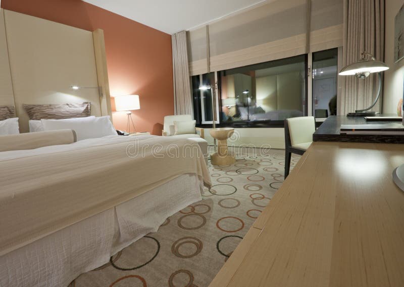 Room with Kingsize Bed Chair Lamps and Desktop Stock Photo Image of