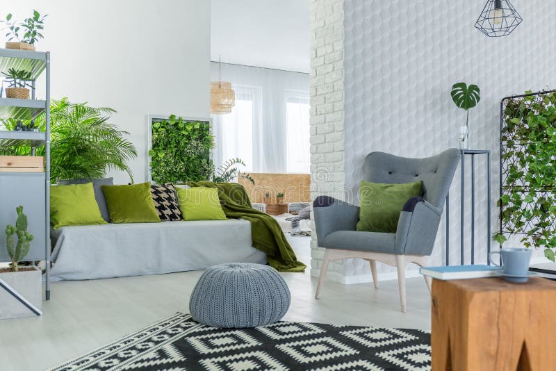 Room with many plants. Big room with many green plants and white brick wall stock photography