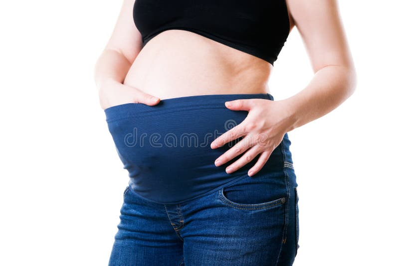 Para Las Mujeres Embarazadas, Tejanos Con La Cintura Aislada En El Fondo Blanco Foto de archivo - Imagen de azul, cuidado: 120856752