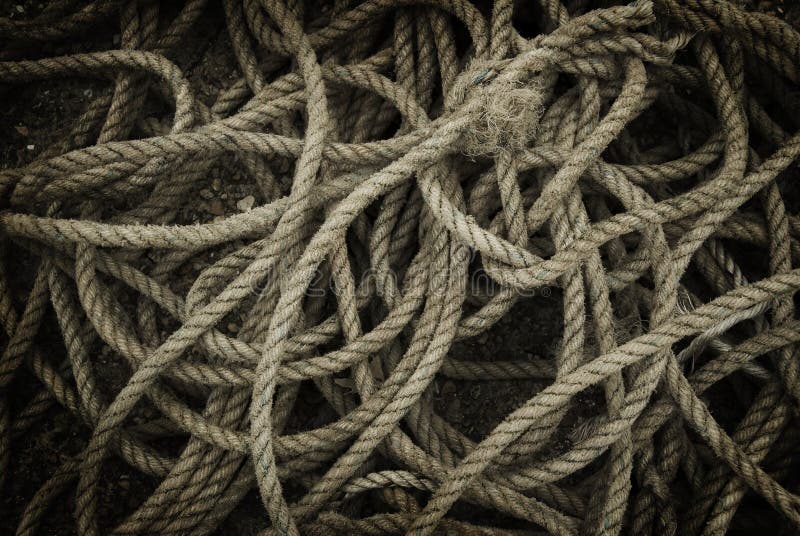 Tangled And Twisted Thin Rope Closeup Stock Photo - Download Image