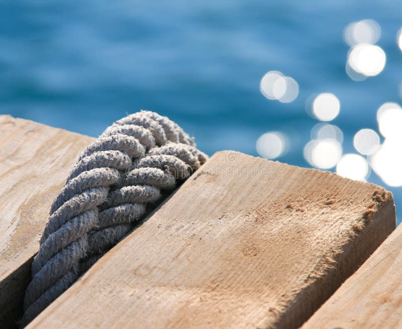 Rope knot on pier royalty free stock image Rope knot on pier royalty free stock image
