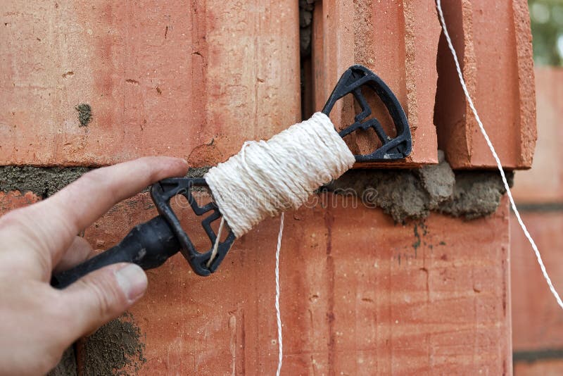 Rope Plumb for Even Brickwork. Compliance with the Correct Laying of