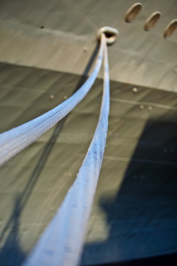 Ropes (hauling lines) of a War ship in a port