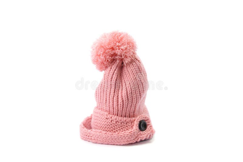 Rosa färger stucken hatt med pompomen som isoleras på vit bakgrund royaltyfria foton Rosa färger stucken hatt med pompomen som isoleras på vit bakgrund royaltyfria foton