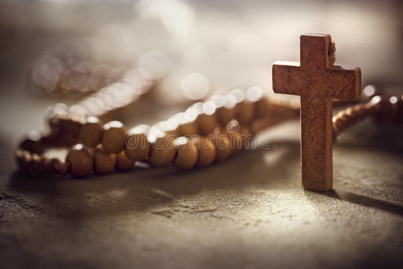 Rosary beads and crucifix cross with copy space background