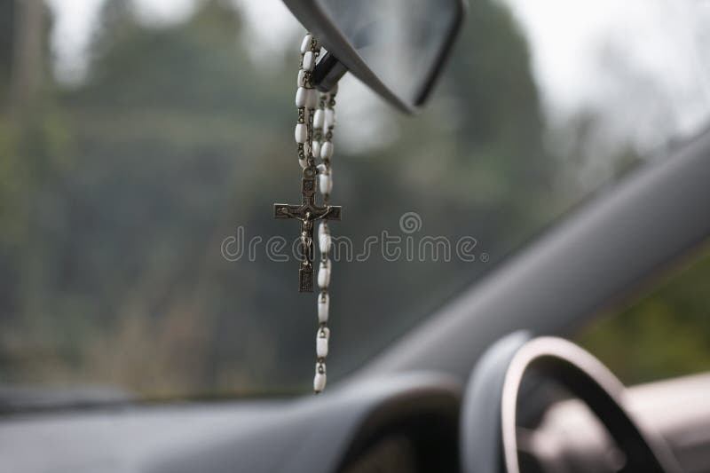 Rosary Beads Hanging In Car stock images Rosary Beads Hanging In Car stock images