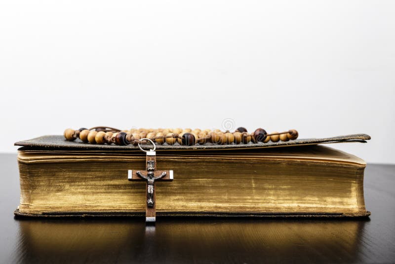Rosary beads and prayer book stock photos Rosary beads and prayer book stock photos