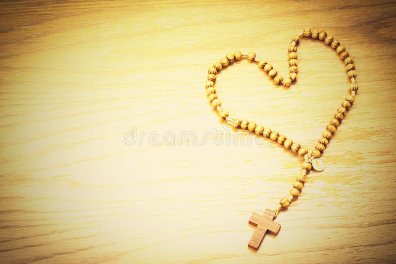 Rosary on a Wooden Background 1 Stock Image - Image of assistance