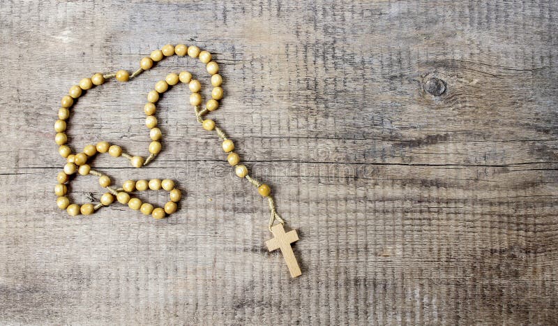 Rosary on wooden table royalty free stock image Rosary on wooden table royalty free stock image
