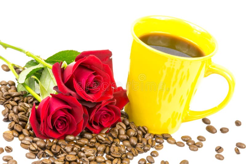 Coffeebeans, a cup and roses. Coffeebeans, a cup and roses