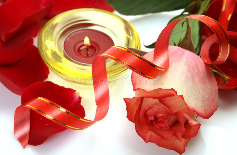 Rose and burning candles stock image. Image of rose 143793469