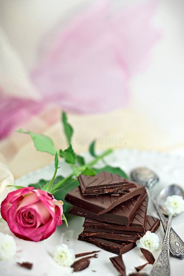 Rose and dark chocolate stock photo Rose and dark chocolate stock photo
