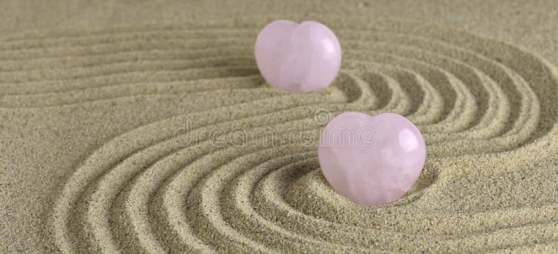 Rose Quartz heart in zen garden