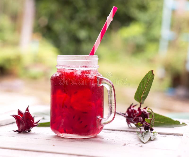 Roselle fruktsaft med blomman royaltyfri foto Roselle fruktsaft med blomman royaltyfri foto