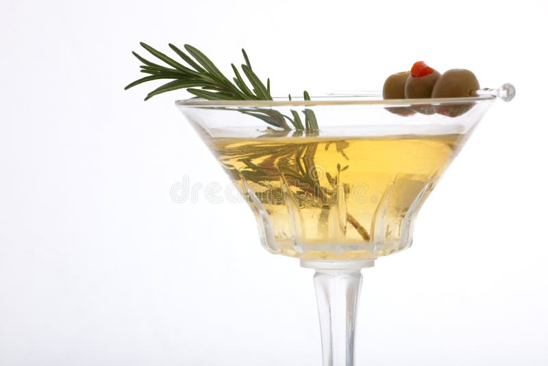 Glass of Rosemary Martini - gin, vodka, garnished with fresh rosemary sprig and olives