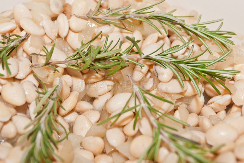 Rosemary white bean soup is rich, healthy and satisfying, with woody flavor of the rosemary and the wholesomeness of the slightly al dente beans.