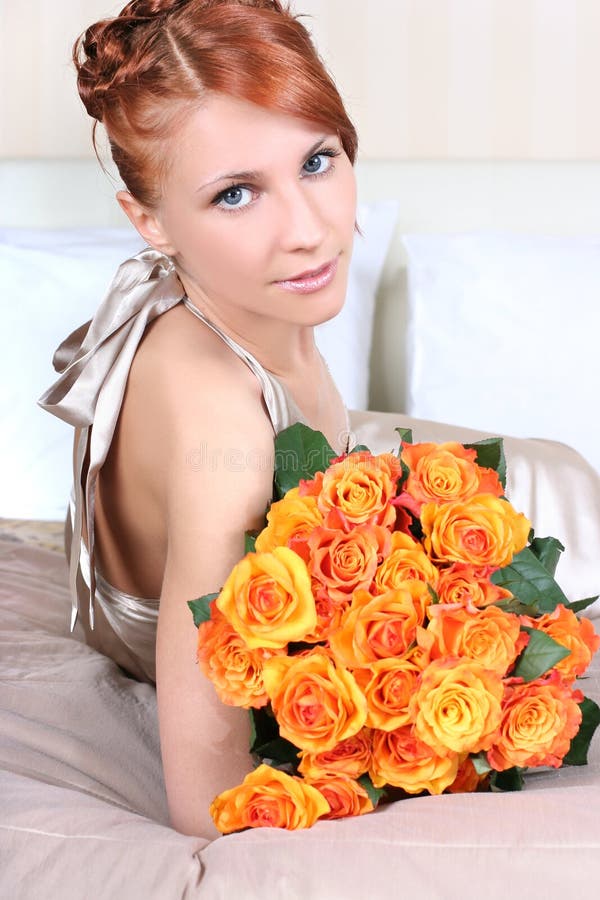 Roses on bed stock image. Image of gift, adult, beautiful 11624203