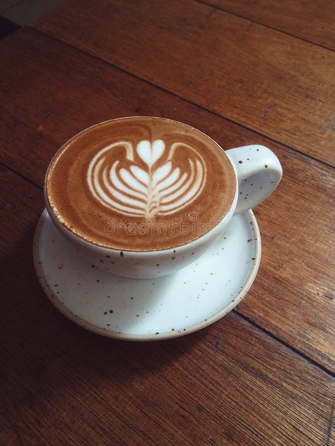 Rosette Latte Art On Cafe Latte On Wooden Table Stock Image - Image of ...