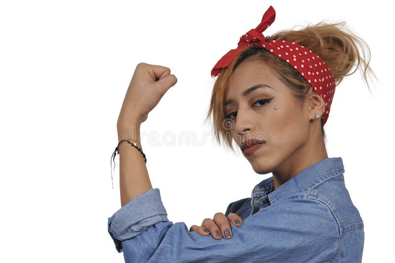 Beautiful woman dressed as the iconic Rosie the Riveter. Beautiful woman dressed as the iconic Rosie the Riveter