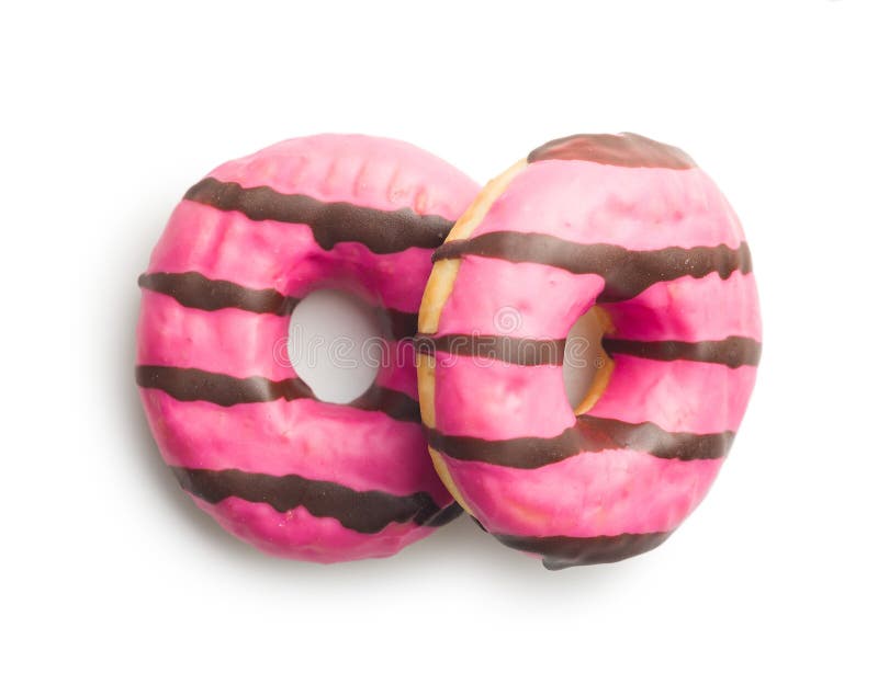 Rosquinha cor-de-rosa doce com listras de chocolate isolada sobre fundo branco fotografia de stock royalty free