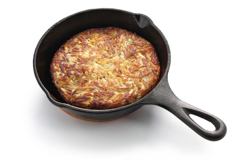 Rosti, Swiss potato pancake in frying pan. Shredded potatoes sauteed on both sides until crisp and golden. Rosti, Swiss potato pancake in frying pan. Shredded potatoes sauteed on both sides until crisp and golden.