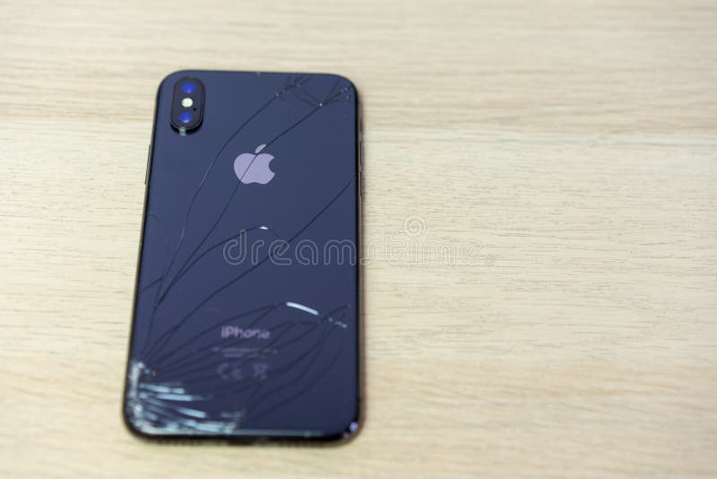 ROSTOV-ON-DON, RUSSIA - DECEMBER 20, 2018: iPhone Ten X with broken display. Modern smartphone with damaged glass screen. Device royalty free stock image ROSTOV-ON-DON, RUSSIA - DECEMBER 20, 2018: iPhone Ten X with broken display. Modern smartphone with damaged glass screen. Device royalty free stock image