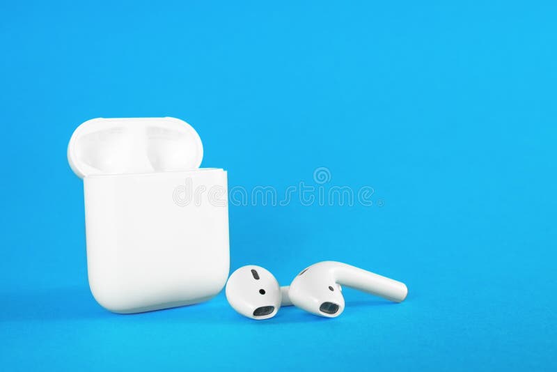 ROSTOV-ON-DON, RUSSIA - February 24, 2019: Apple AirPods wireless Bluetooth headphones and charging case for Apple iPhone. New App