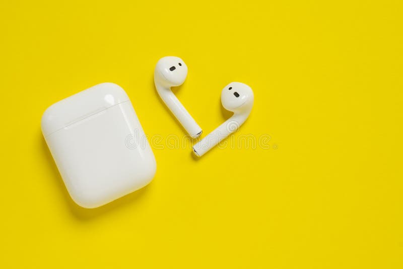 ROSTOV-ON-DON, RUSSIA - October 07, 2019: Apple AirPods wireless Bluetooth headphones and charging case for  Apple iPhone. New