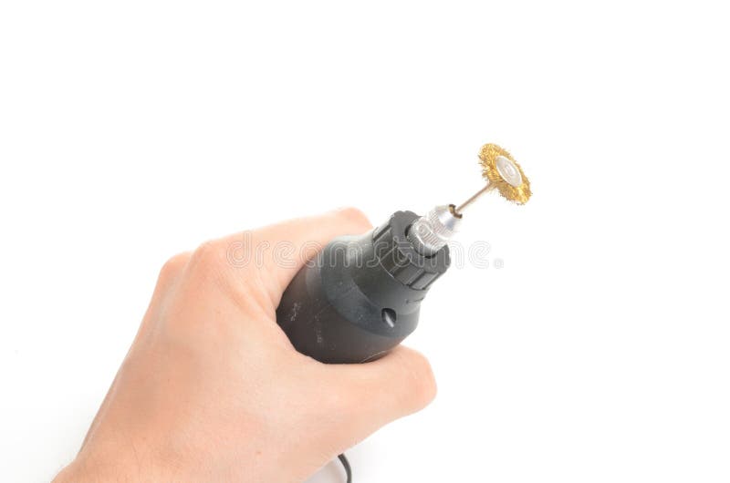 Rotary tool in hand stock image. Image of rotary, white 33018899