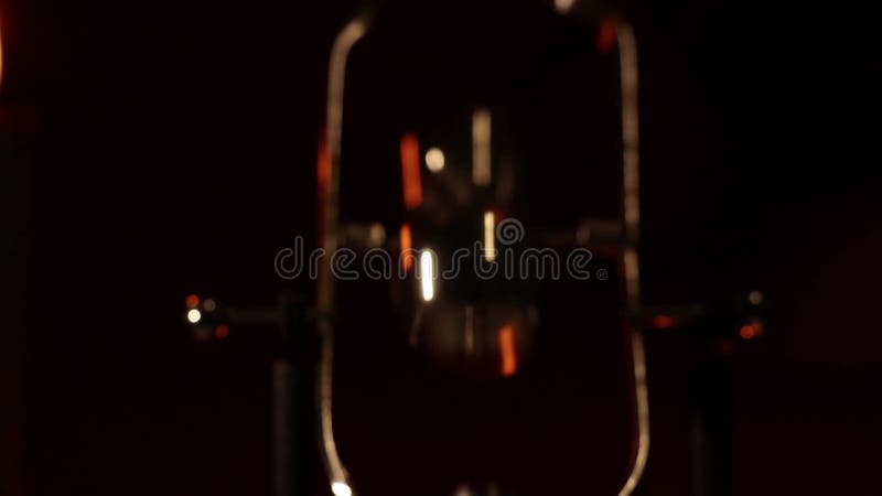 Rotating table pendulum balls antistress in the dark, for meditation, pendulum with rotating balls stock video