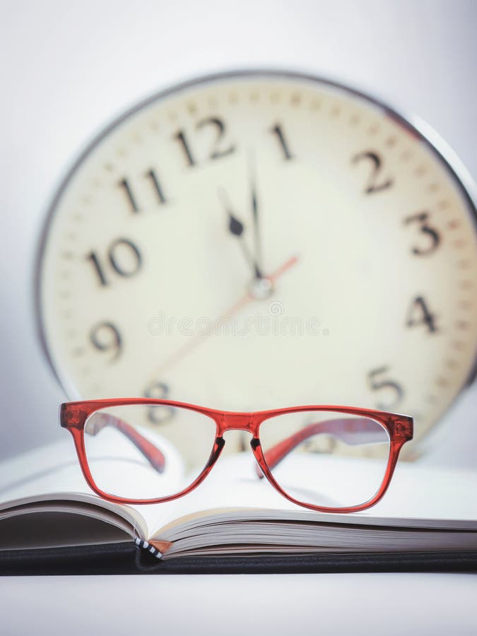 Red glasses on the book (stay up late studying). Red glasses on the book (stay up late studying)